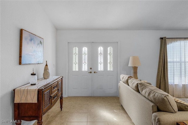 entrance foyer featuring light tile patterned flooring