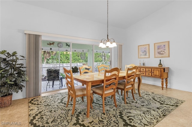 dining room with light tile patterned floors and a chandelier