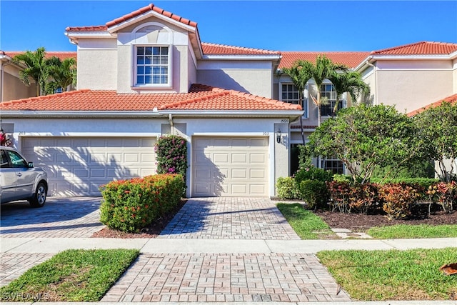 view of front of property with a garage