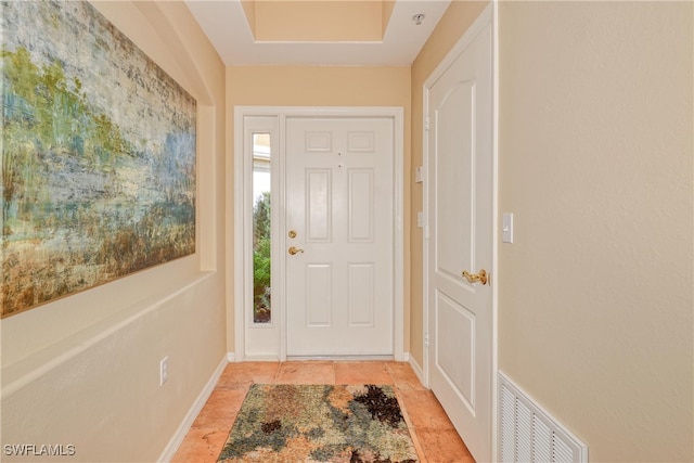 entrance foyer with light tile patterned floors