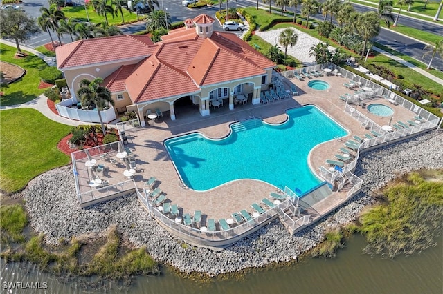 birds eye view of property featuring a water view