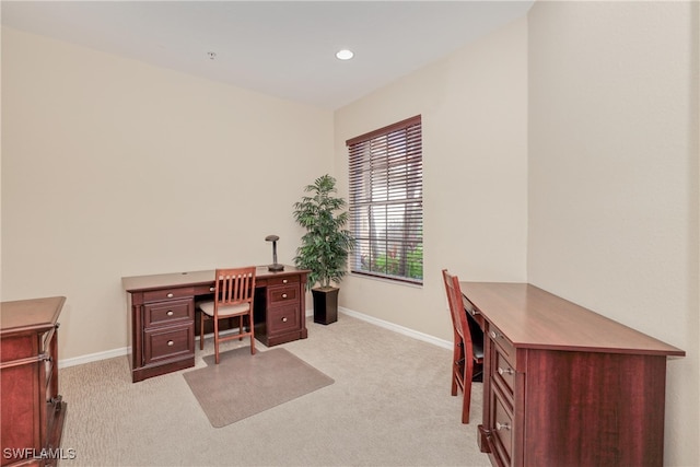 office space with light colored carpet