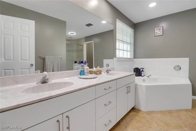 bathroom featuring vanity, separate shower and tub, and tile patterned flooring