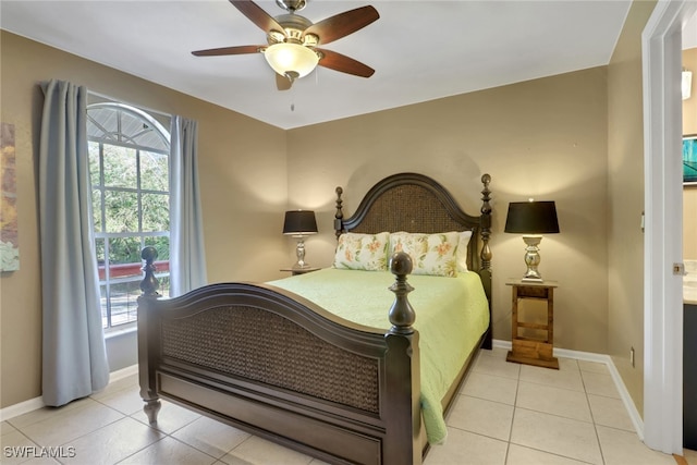 bedroom with light tile patterned floors and ceiling fan