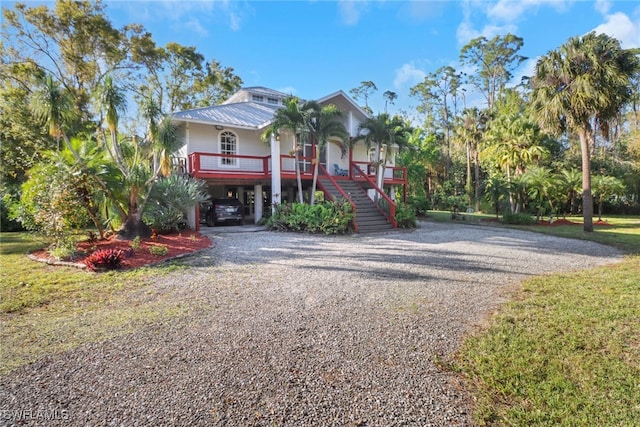 view of front facade with a carport and a porch