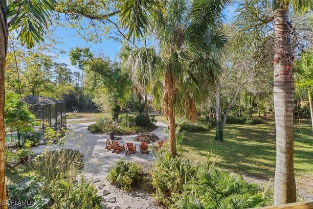 view of home's community featuring a yard