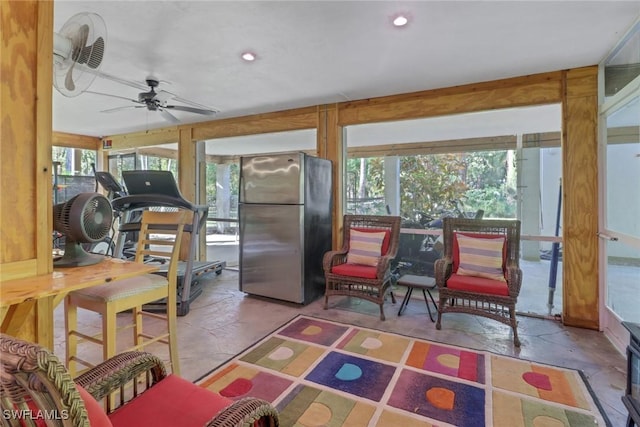 interior space featuring ceiling fan