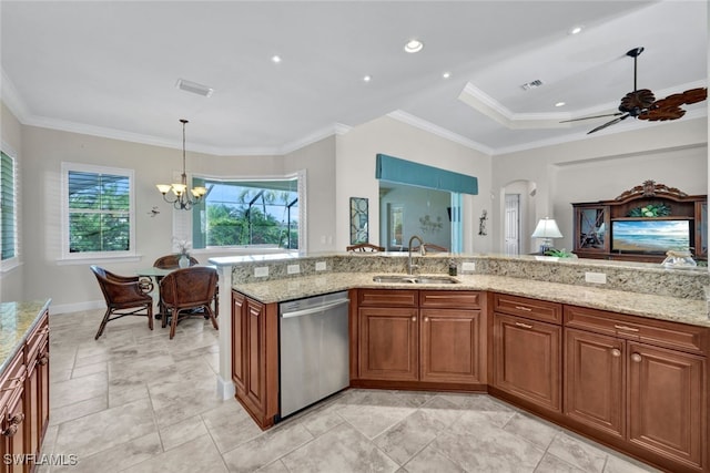 kitchen with light stone countertops, ceiling fan with notable chandelier, sink, decorative light fixtures, and dishwasher