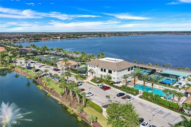 drone / aerial view with a water view