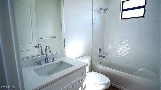 full bathroom featuring shower / washtub combination, vanity, and toilet