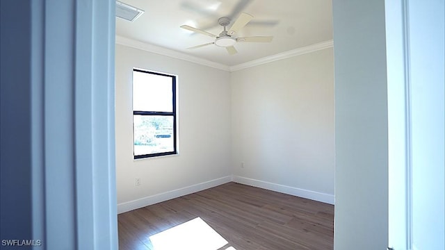 unfurnished room with ceiling fan, wood-type flooring, and ornamental molding