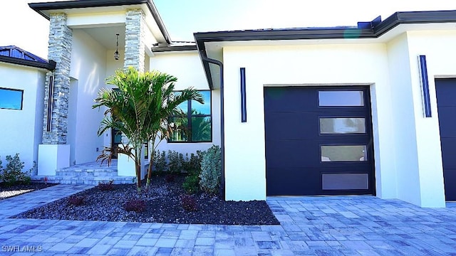 property entrance with a garage