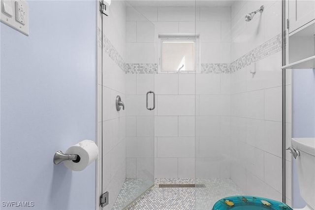 bathroom featuring a stall shower