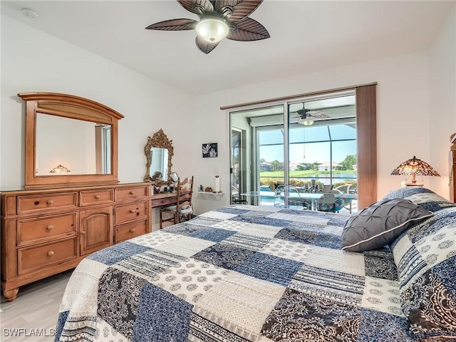 bedroom with ceiling fan, light wood-type flooring, and access to outside