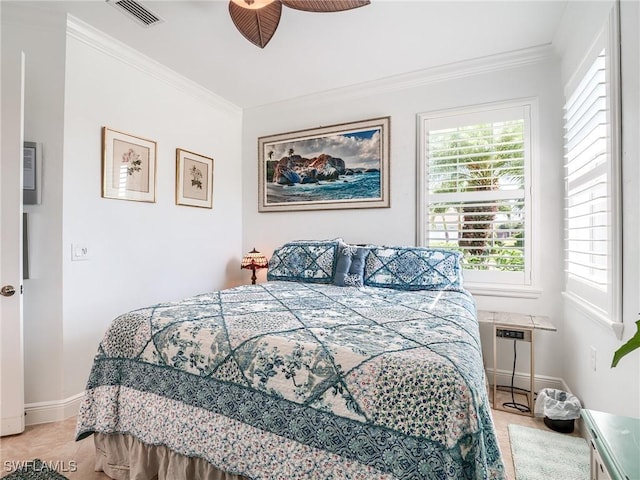 bedroom with multiple windows, ceiling fan, and crown molding