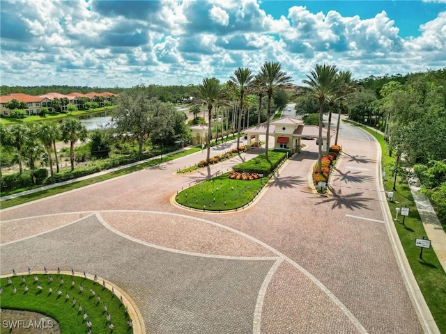 surrounding community featuring a water view