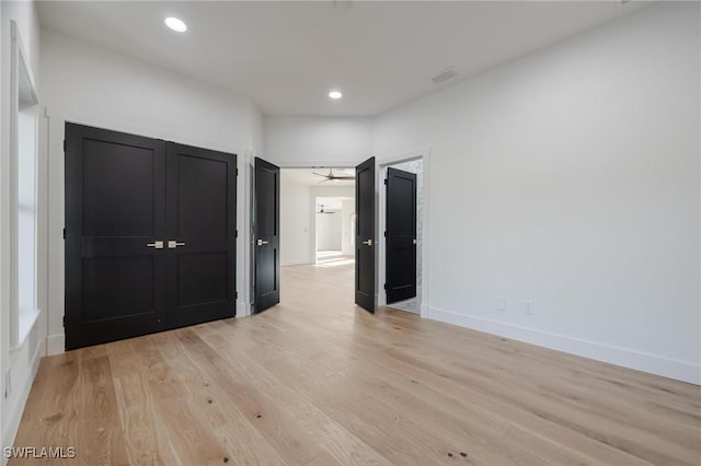 unfurnished bedroom featuring light hardwood / wood-style floors