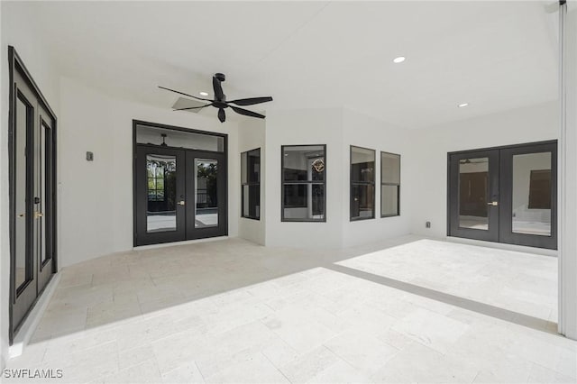 view of patio / terrace featuring ceiling fan and french doors