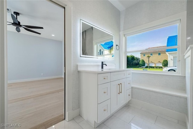 bathroom with vanity, tile patterned floors, and ceiling fan