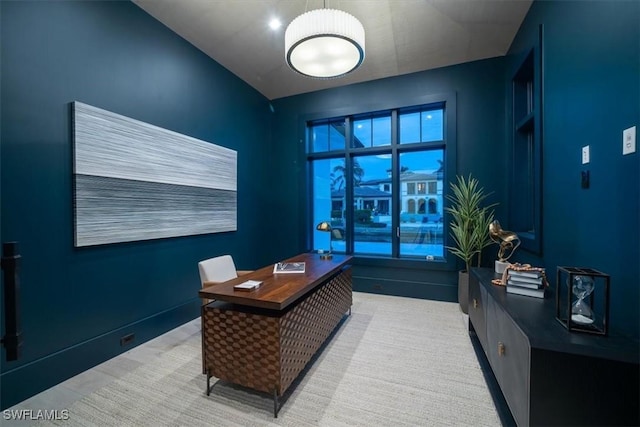 home office with vaulted ceiling