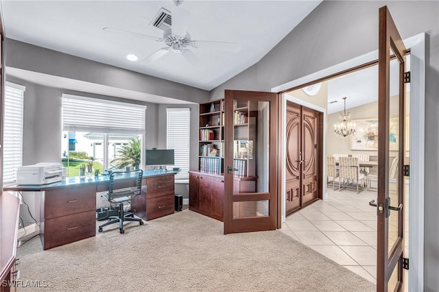 carpeted office space with french doors, ceiling fan with notable chandelier, and lofted ceiling