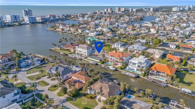 birds eye view of property featuring a water view