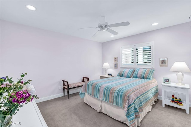 carpeted bedroom featuring ceiling fan