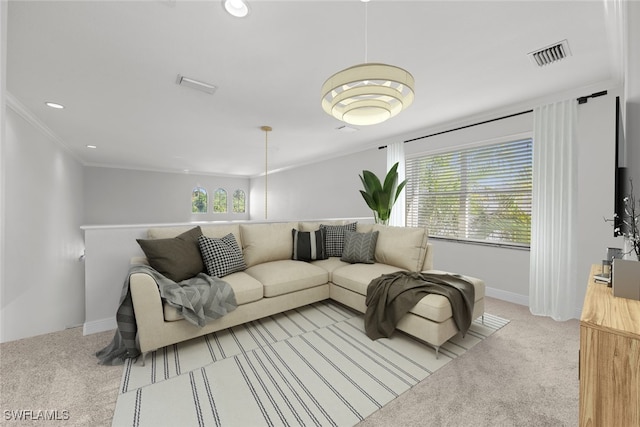 living room featuring light colored carpet and crown molding