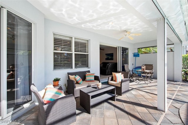 view of patio / terrace featuring an outdoor living space and ceiling fan