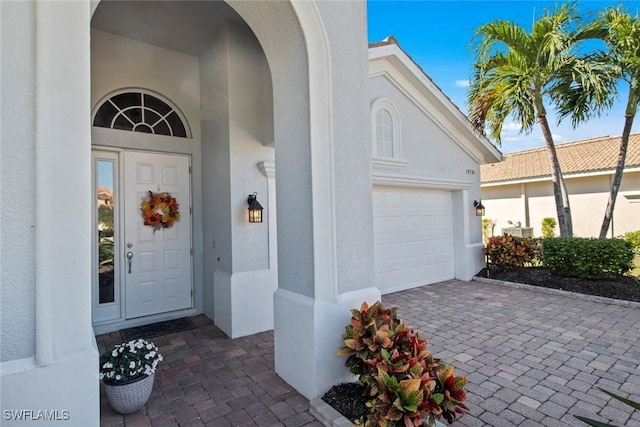 property entrance featuring a garage