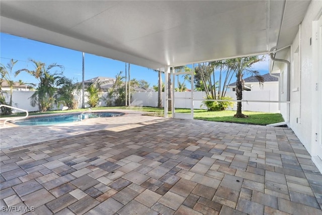 view of swimming pool featuring a patio area and a lawn