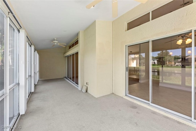 unfurnished sunroom featuring a barn door