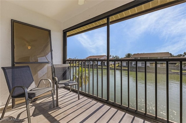 sunroom with a water view