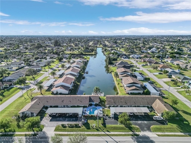 drone / aerial view with a water view