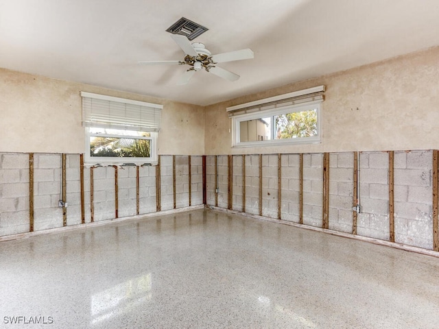 interior space featuring ceiling fan