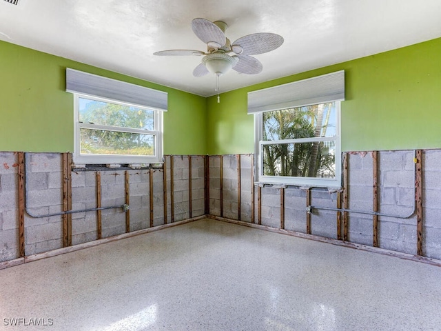 empty room featuring ceiling fan