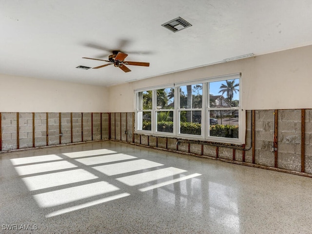 spare room featuring ceiling fan