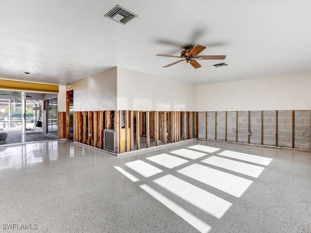 spare room with ceiling fan