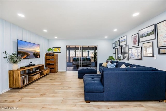 living room with light hardwood / wood-style flooring