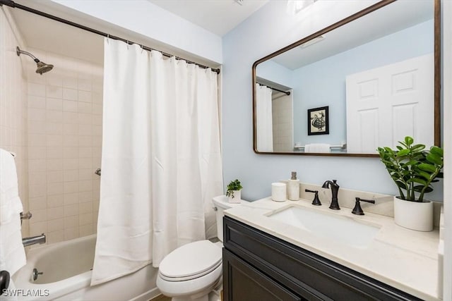 full bathroom featuring vanity, toilet, and shower / bath combo with shower curtain