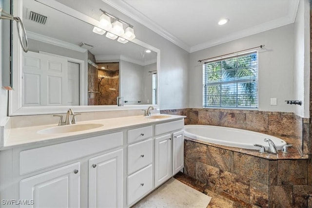 bathroom featuring separate shower and tub, vanity, and ornamental molding