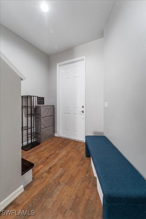 interior space with dark wood-type flooring