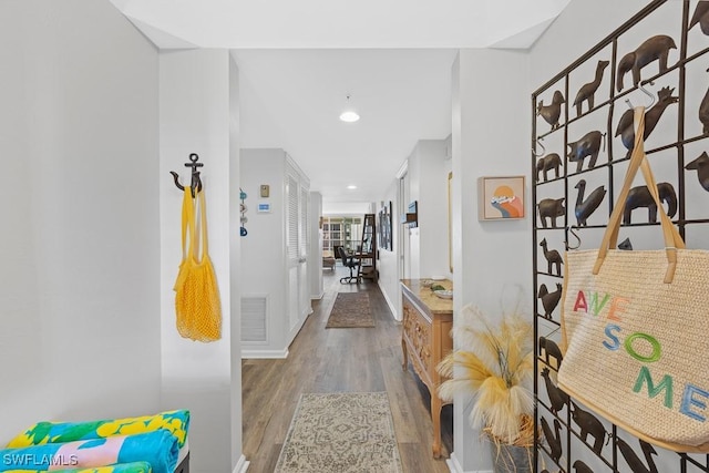 hallway featuring light hardwood / wood-style flooring