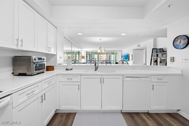 kitchen featuring white cabinets, dishwasher, and dark hardwood / wood-style flooring