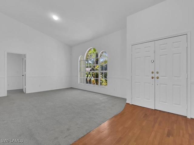 foyer with wood-type flooring