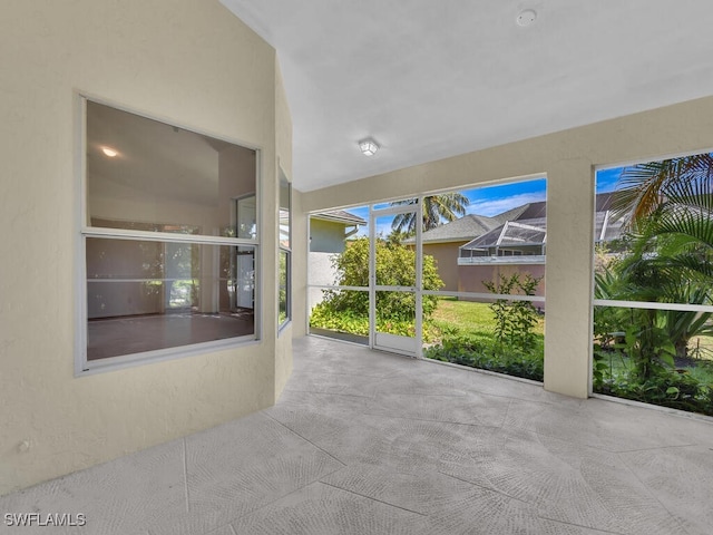 view of unfurnished sunroom