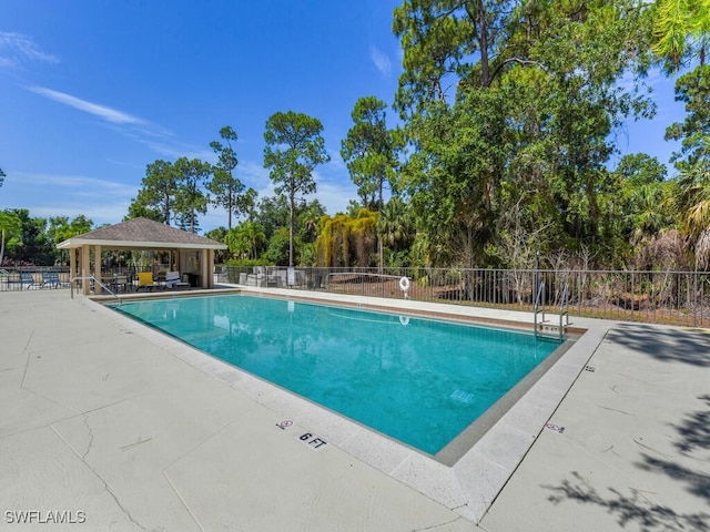 view of pool with a gazebo and a patio area