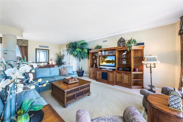 living room featuring light colored carpet