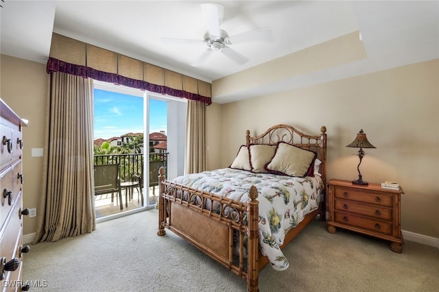 carpeted bedroom with ceiling fan and access to outside