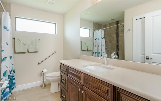 bathroom with a shower with shower curtain, vanity, toilet, and tile patterned floors